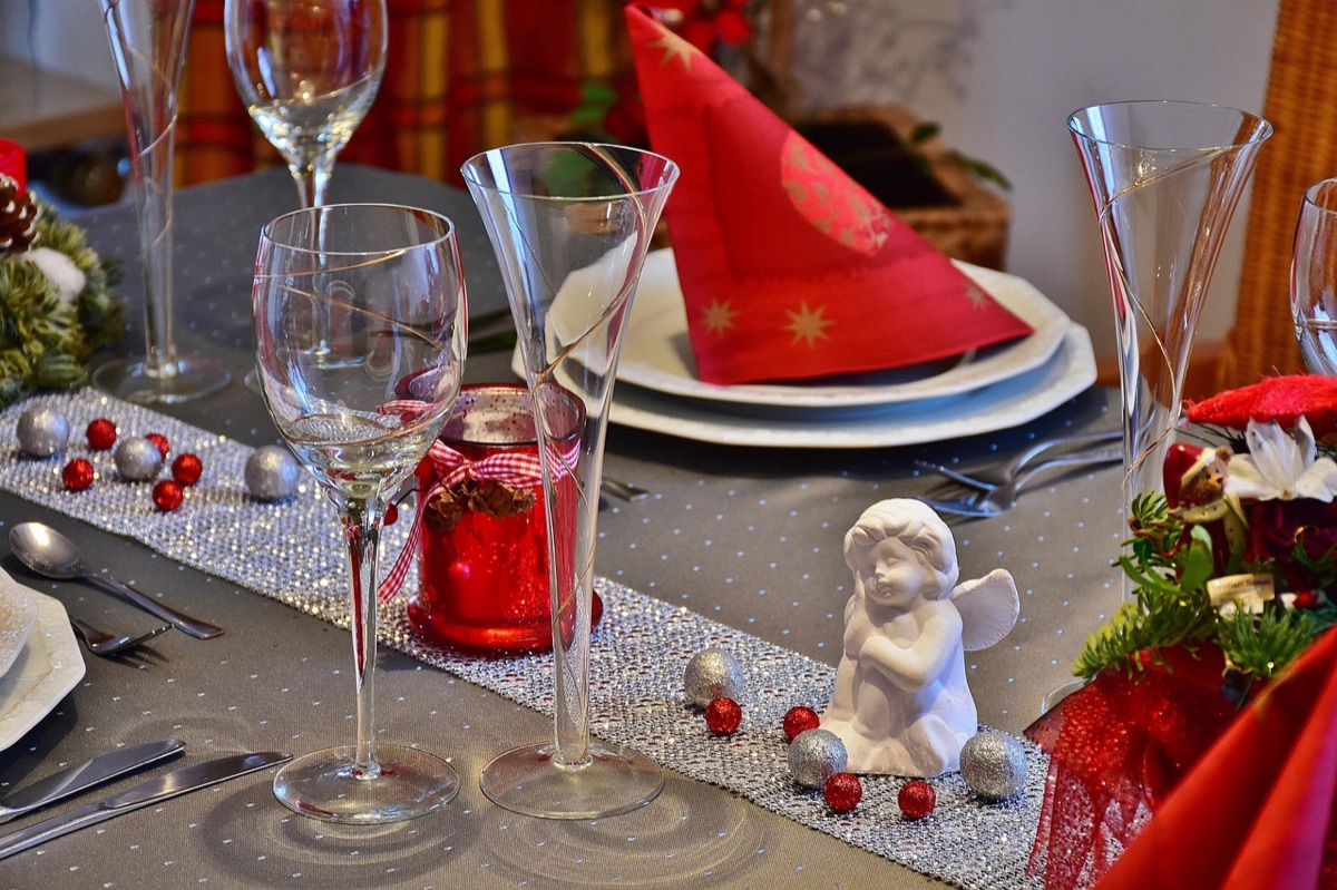 Family discussing health insurance costs at dining table